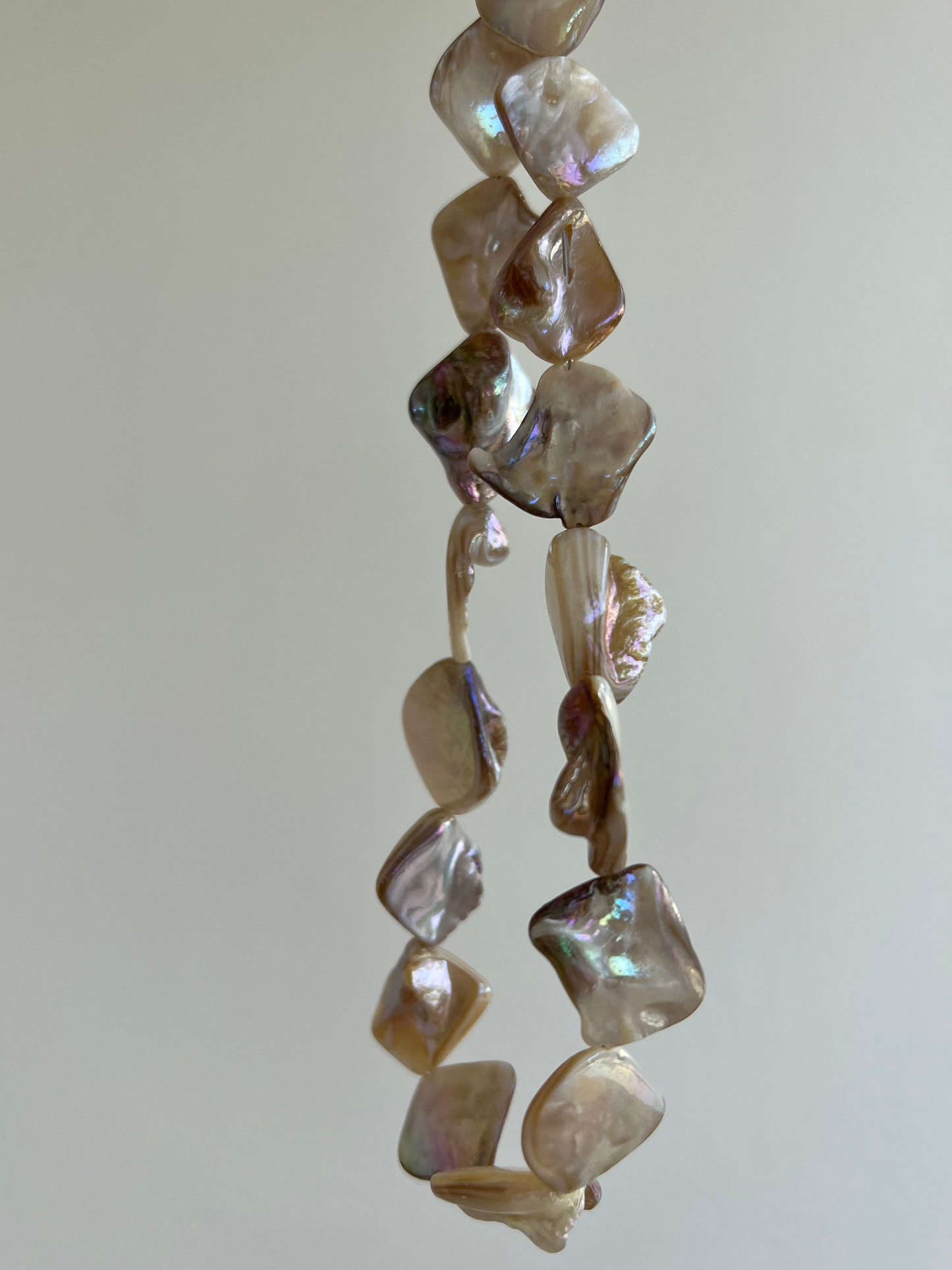 Exquisite mother of pearl shell necklace, showcasing unparalleled uniqueness and natural beauty in its design.