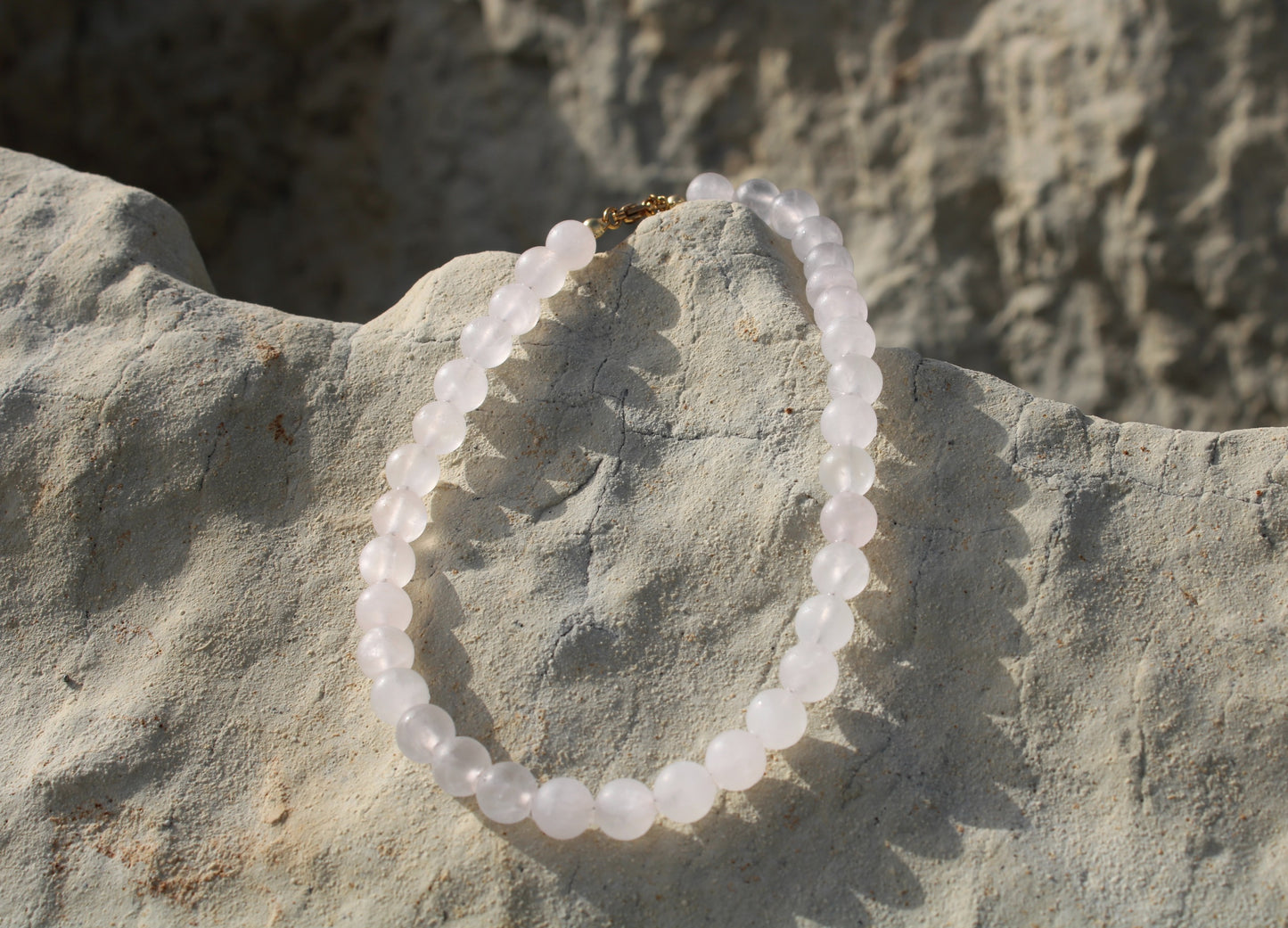 Pale pink quartz necklace, delicately crafted for a subtle yet radiant touch of femininity.
