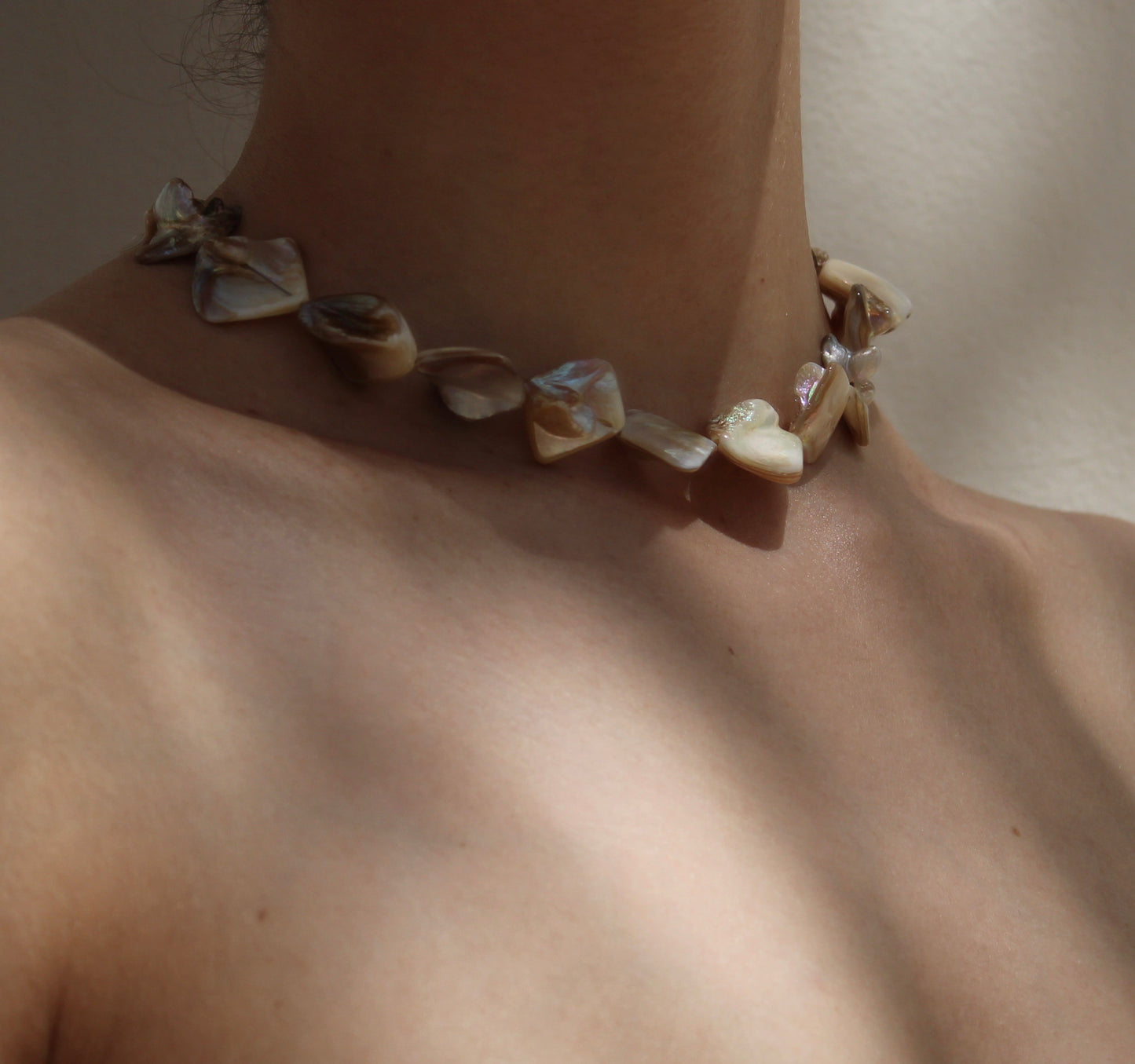 Exquisite mother of pearl shell necklace, showcasing unparalleled uniqueness and natural beauty in its design.