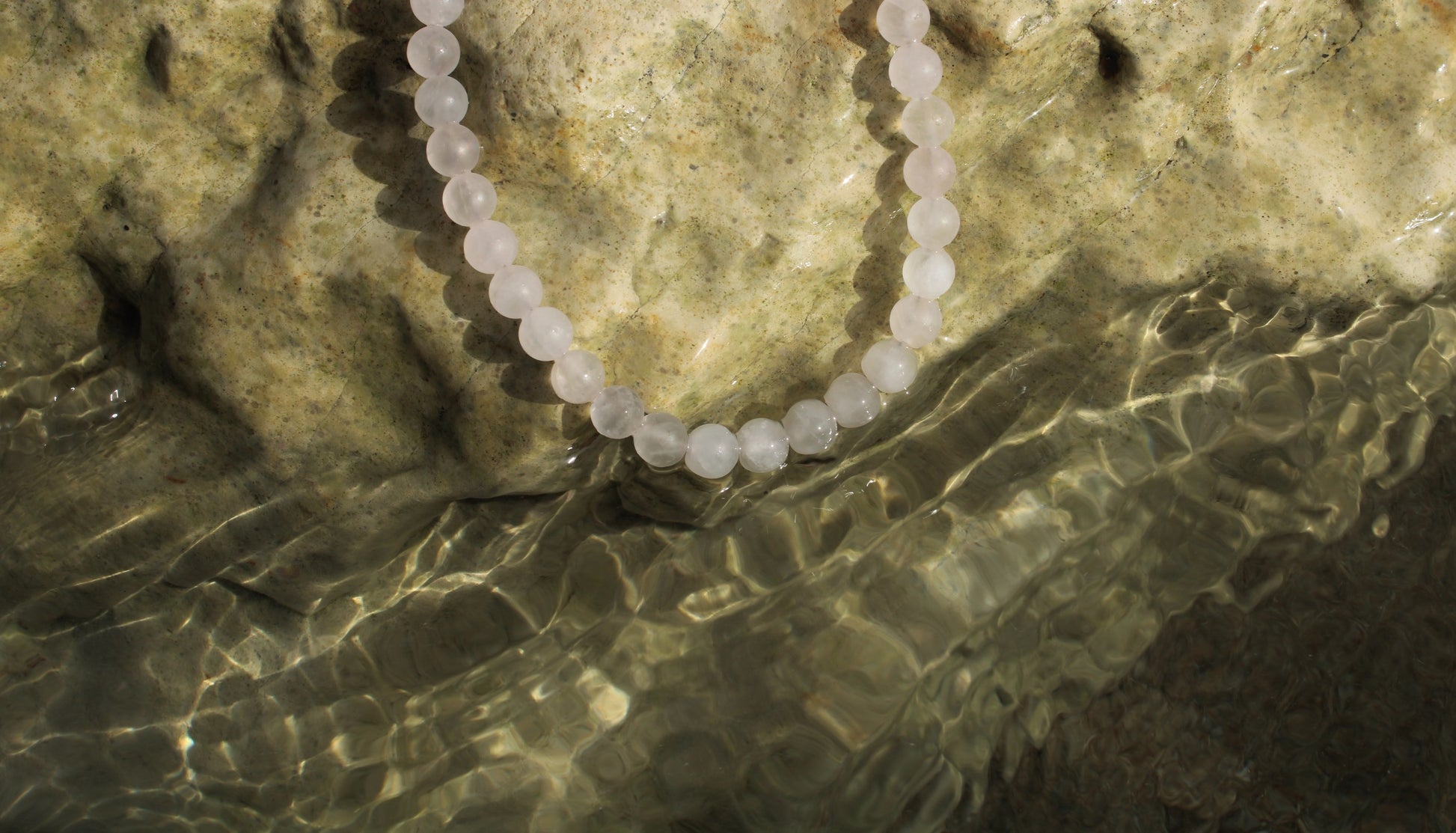 Pale pink quartz necklace, delicately crafted for a subtle yet radiant touch of femininity.