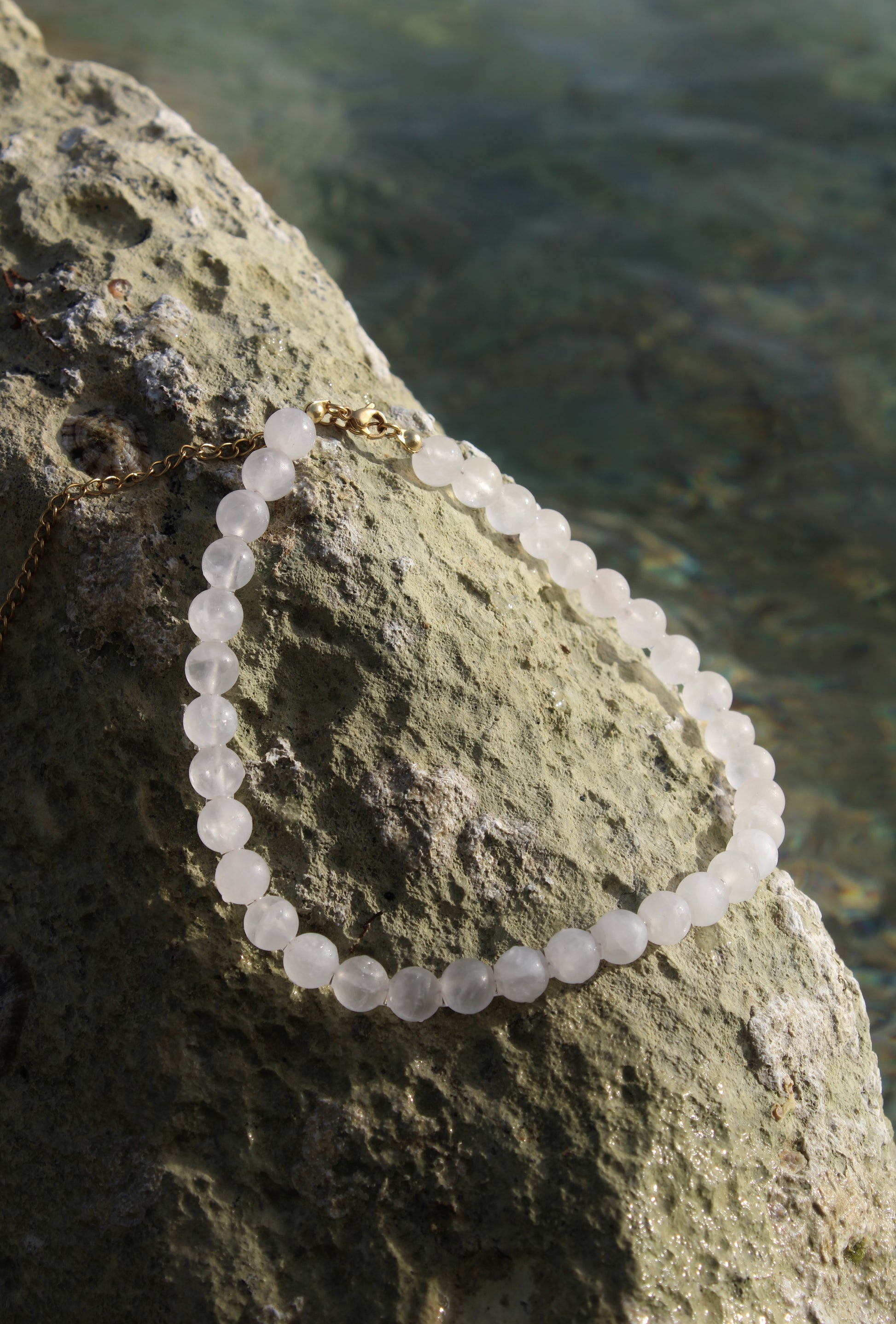 Pale pink quartz necklace, delicately crafted for a subtle yet radiant touch of femininity.