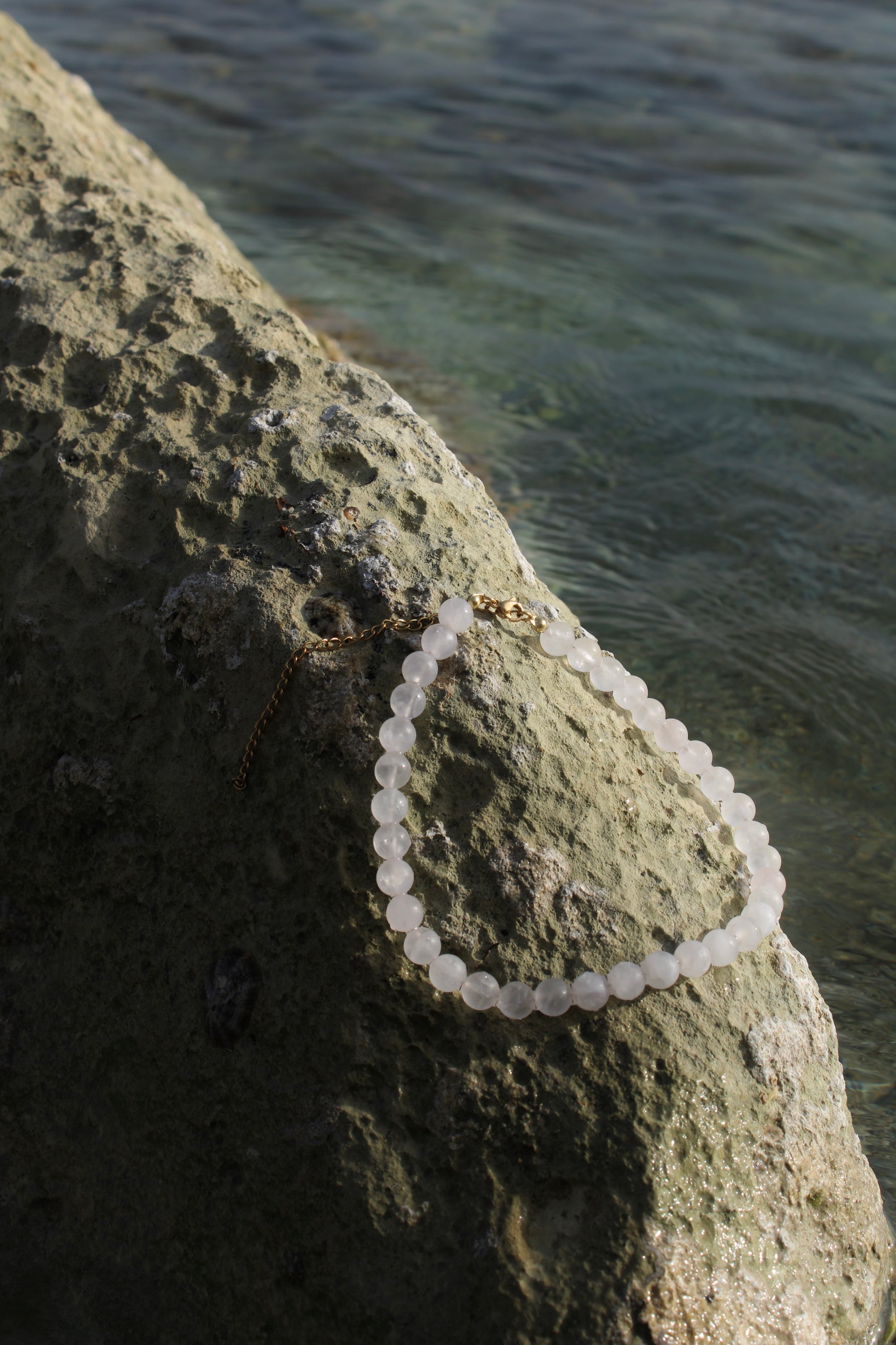 Pale pink quartz necklace, delicately crafted for a subtle yet radiant touch of femininity.