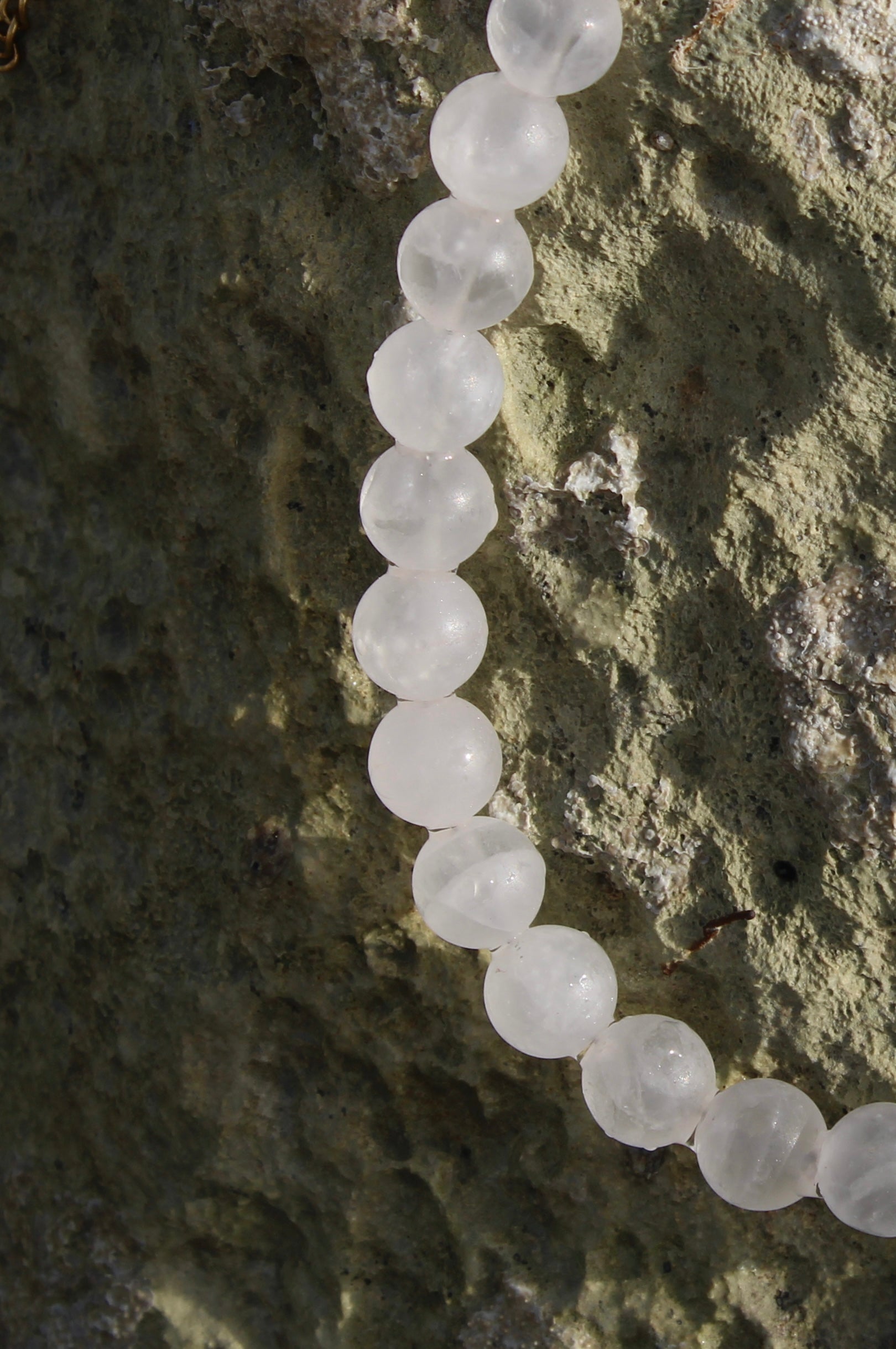 Pale pink quartz necklace, delicately crafted for a subtle yet radiant touch of femininity.