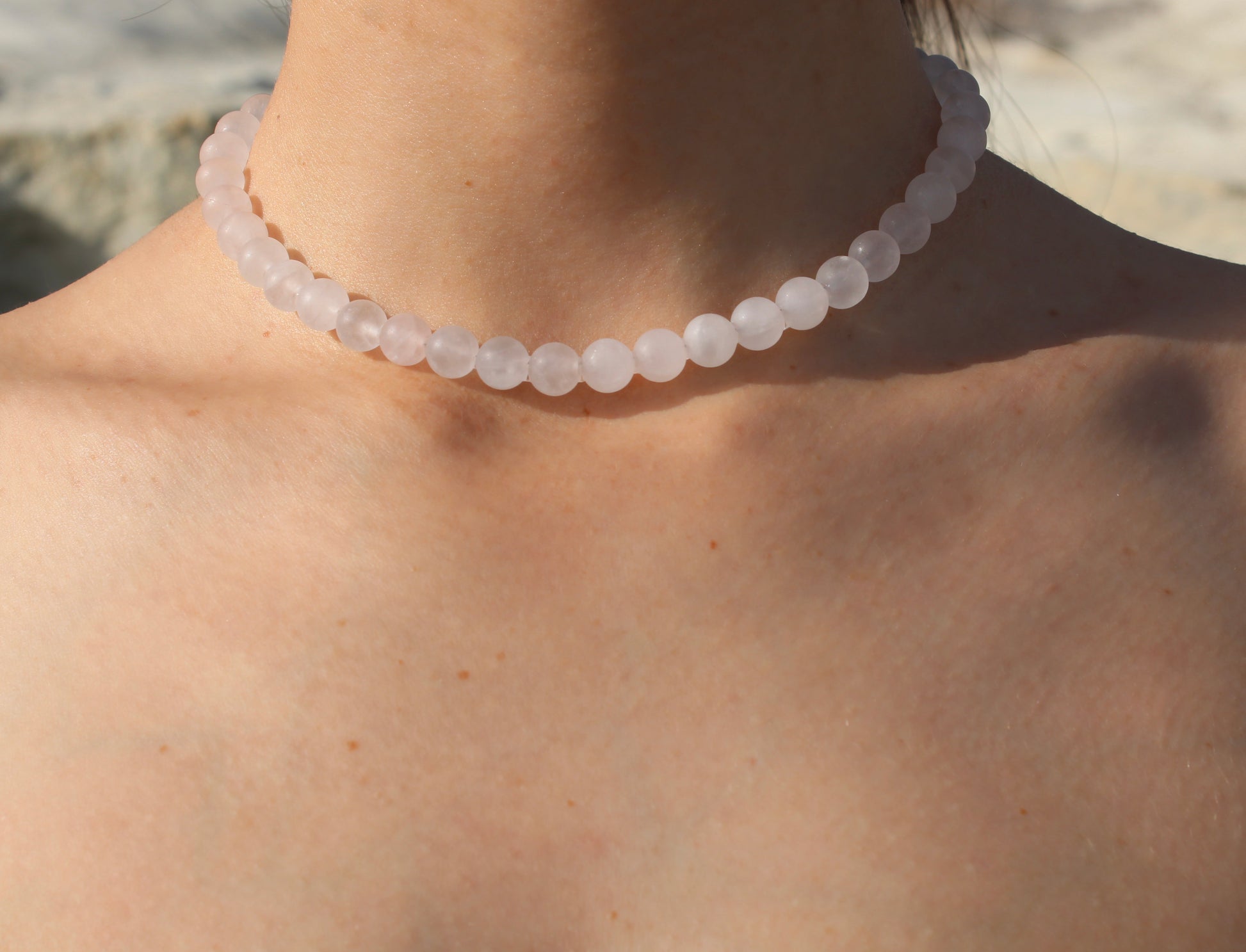 Pale pink quartz necklace, delicately crafted for a subtle yet radiant touch of femininity.