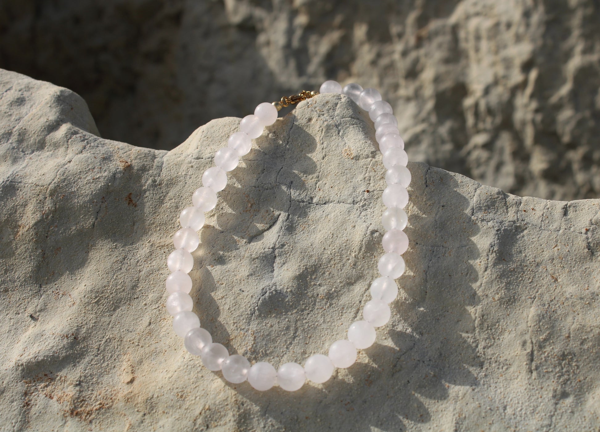 Pale pink quartz necklace, delicately crafted for a subtle yet radiant touch of femininity.